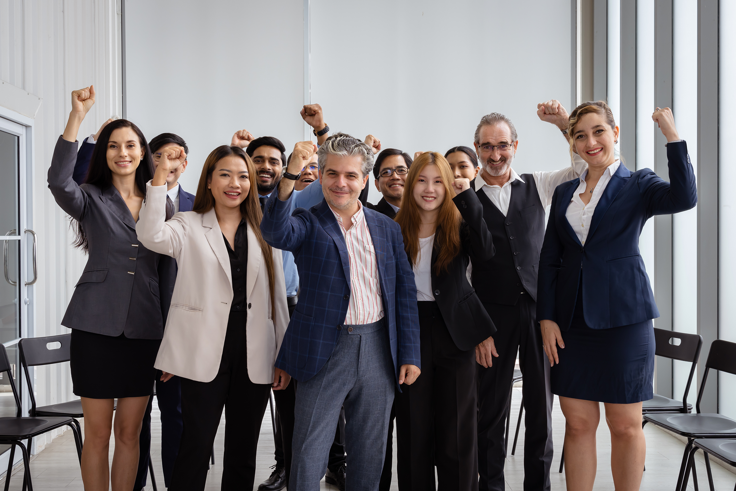 Equipo certificado Green Belt celebrando resultados